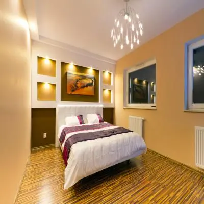 Master Bedroom Design with Brown and Orange Walls