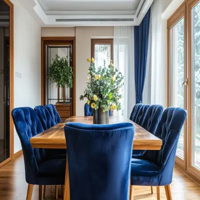 Modern 6-Seater Wooden Dining Room Design With Navy Blue Tufted Chairs