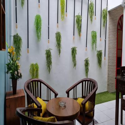 Cosy Green Toned Balcony Design