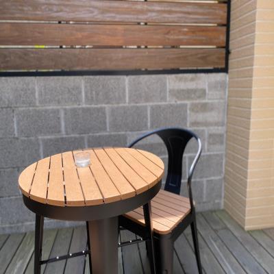 Elegant Contemporary Balcony Design with a Steel Table and Chair