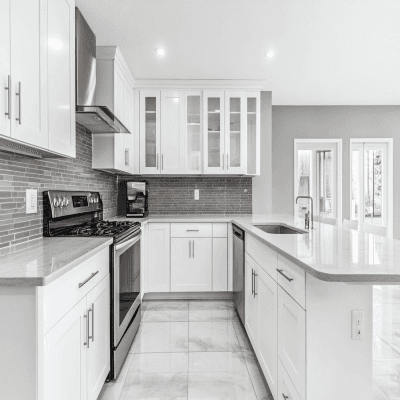 Modern White U-shaped modular Kitchen Design With Grey Textured Backsplash