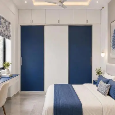 Blue And White Sliding Wardrobe Design With Loft