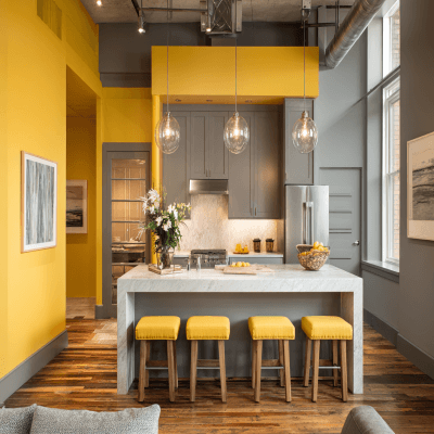 Calm Yellow and Grey Wall Colour Combination for Kitchen with Industrial Lights and Island Seating