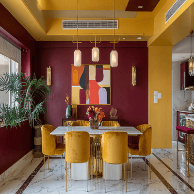 Colourful Maroon and Gold Wall Colour Combination for Dining Room with Velvet Chairs and Marble Table