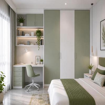 Contemporary Green And White Wardrobe Design With Attached Study Table