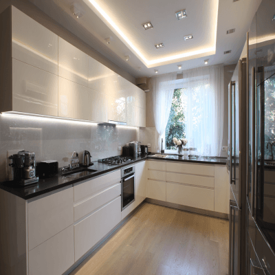 Contemporary L-Shaped Kitchen Design in White with Modern Glossy Finishes