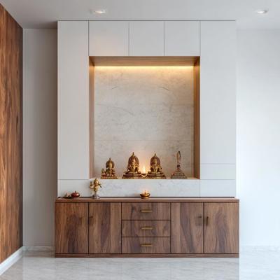 Contemporary Pooja Room Design With White Backdrop And Wooden Storage Cabinet