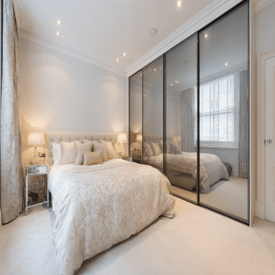 Modern 4-Door Wardrobe Design with Sliding Glass Shutters