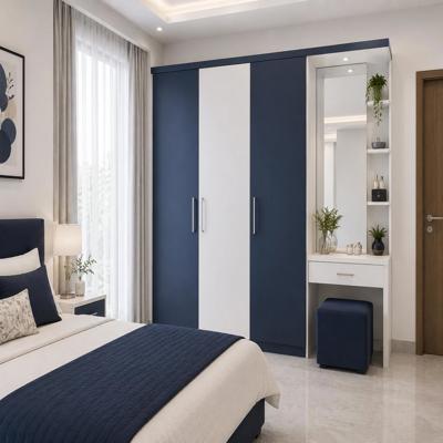 Modern Blue And White Wardrobe Design With Hinged Shutters And Dressing Unit