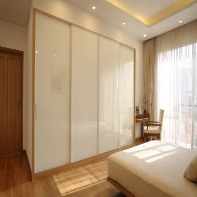 Modern Sliding Wardrobe Design in High Gloss Off White Finish