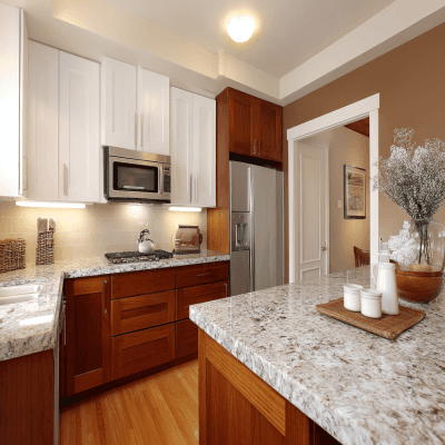 Simple Brown and White Wall Colour Combination for Kitchen with Granite Countertop and Wooden Cabinets